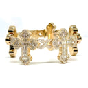 Gold bracelet with cross designs on a white background