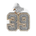 Earring with diamond-studded '39' design on a white background