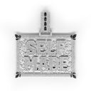Decorative silver pendant with intricate designs and black gemstones on a white background